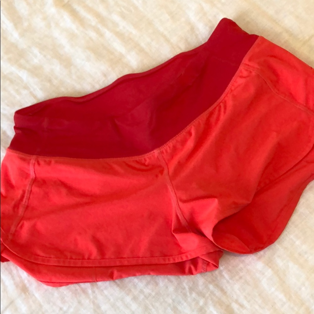 Lululemon neon orange speed shorts